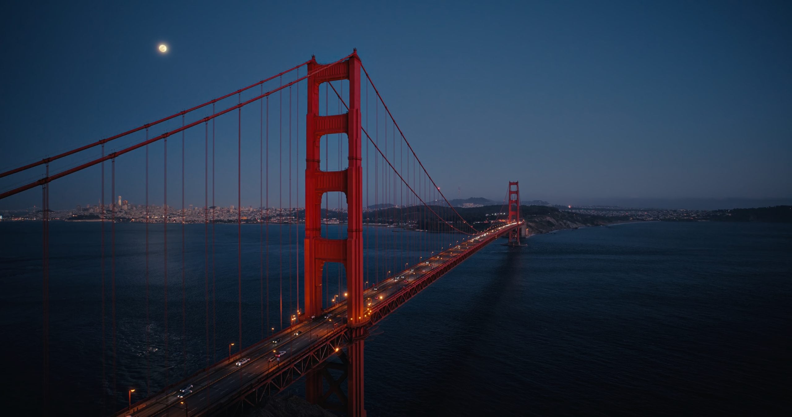 Fondo de pantalla oficial de macOS Golden Gate 27 (Noche)